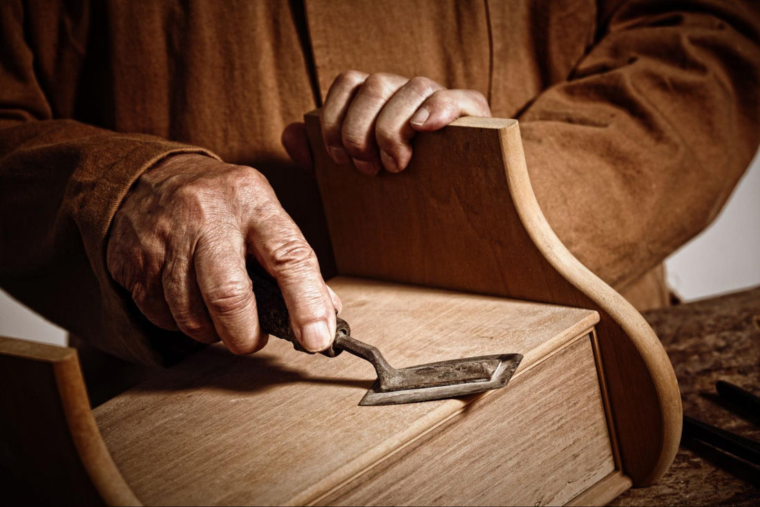 Aging hands crafting furniture