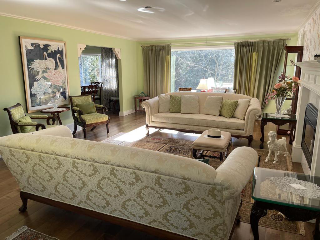 Living room with beige sofas - House of Chippendale