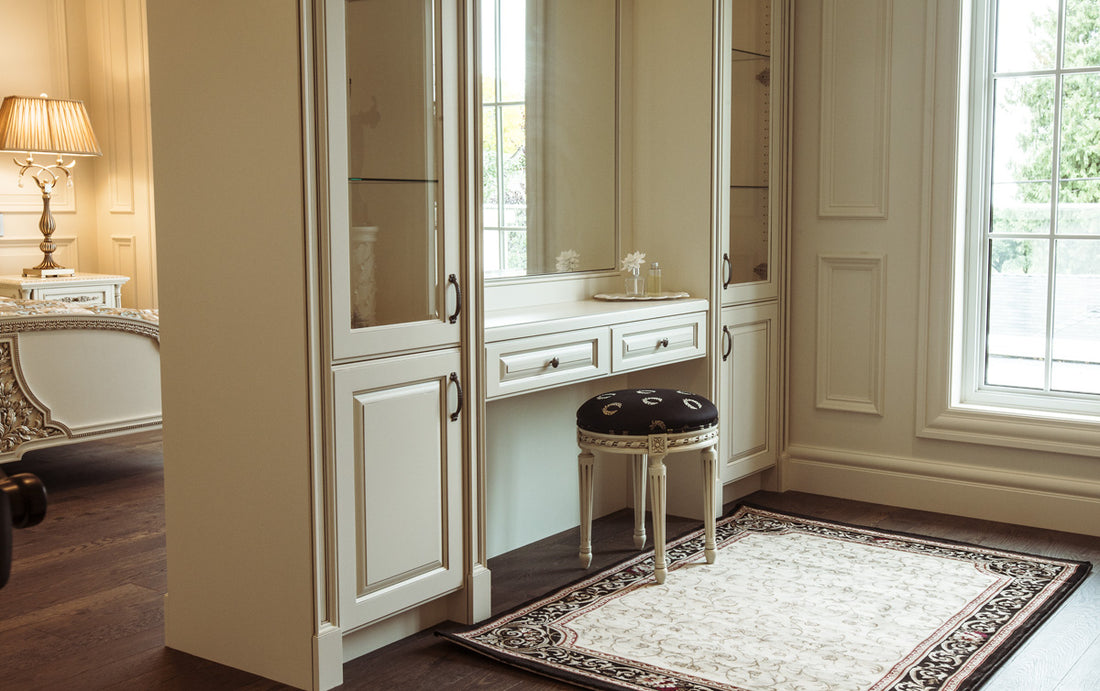 Ornate master bedroom vanity with stool and rug - House of Chippendale
