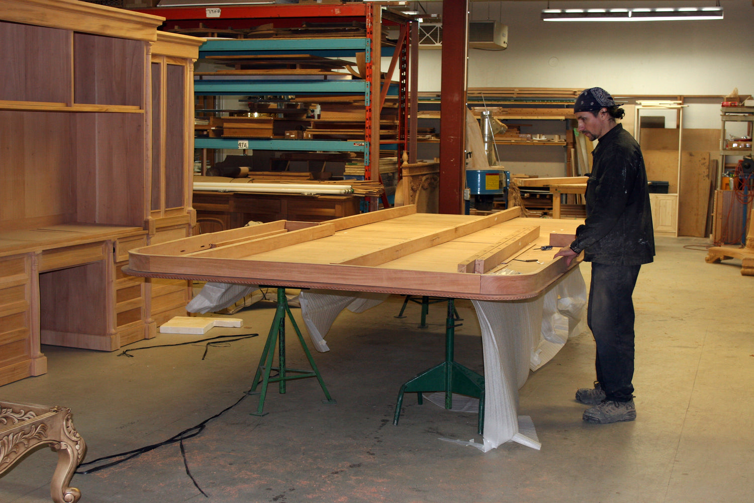 14-foot dining table with a polished wooden surface