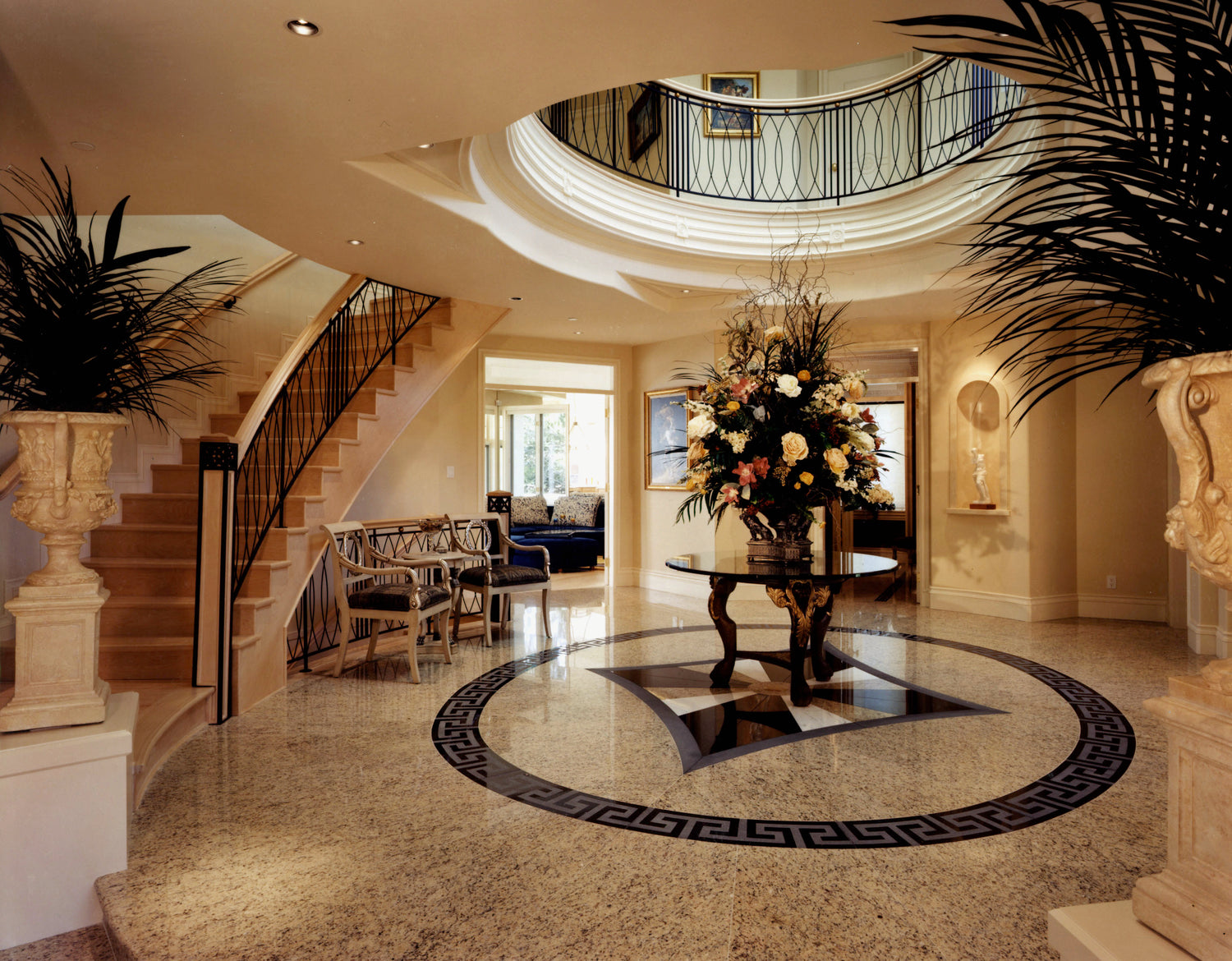 Spacious hallway featuring classic architectural details and polished wooden floors.