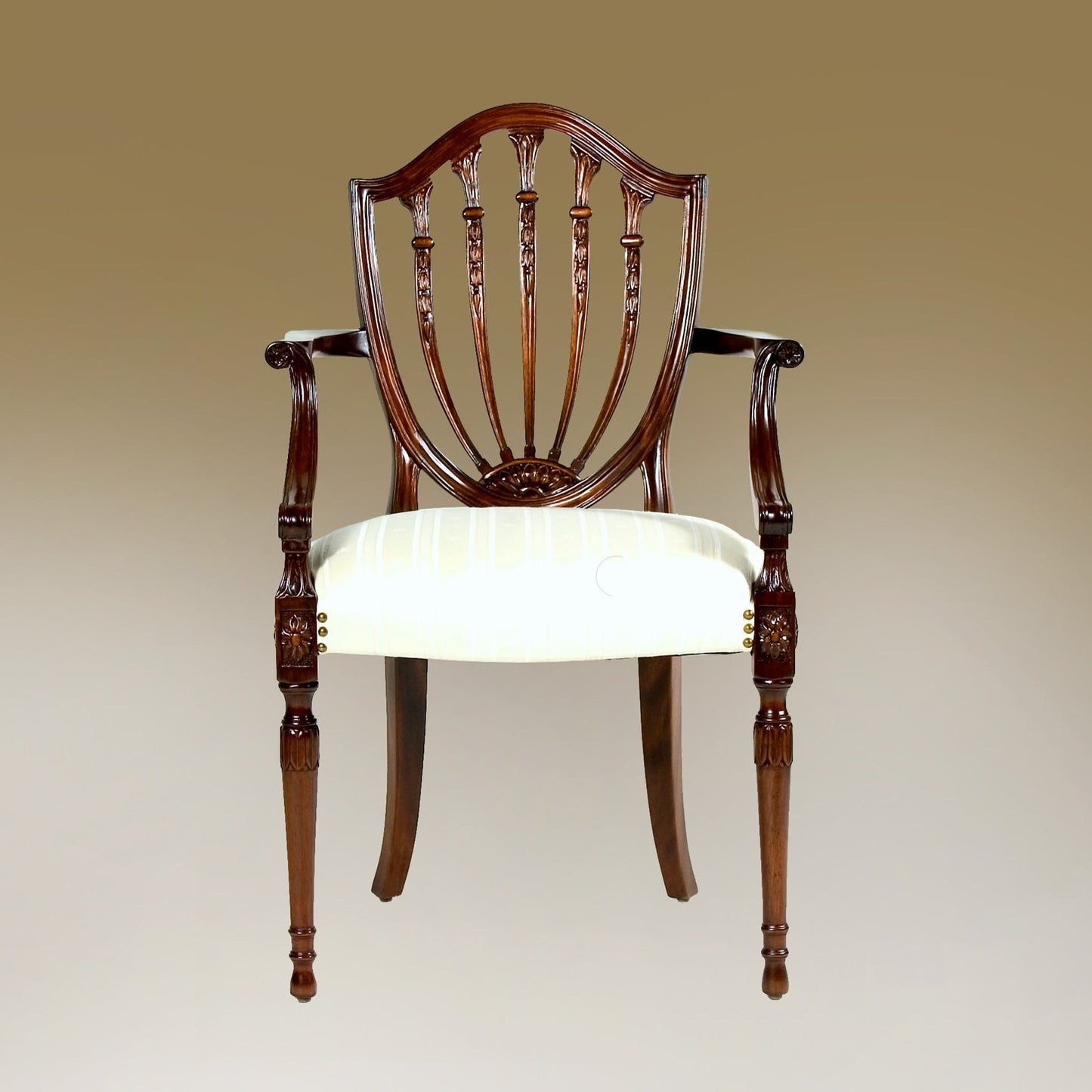 Prince of Wales armchair with carved backrest and upholstered seat.