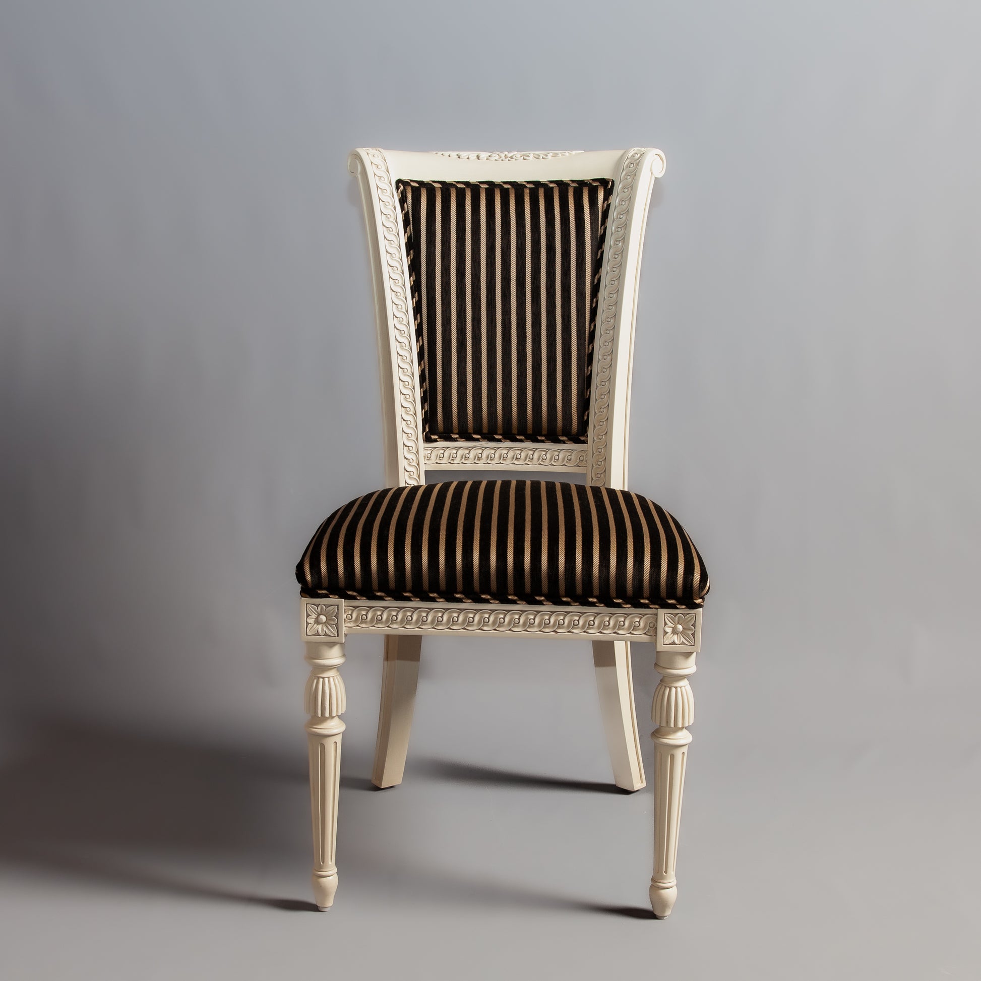 Angled view capturing the chair's overall craftsmanship and finish.