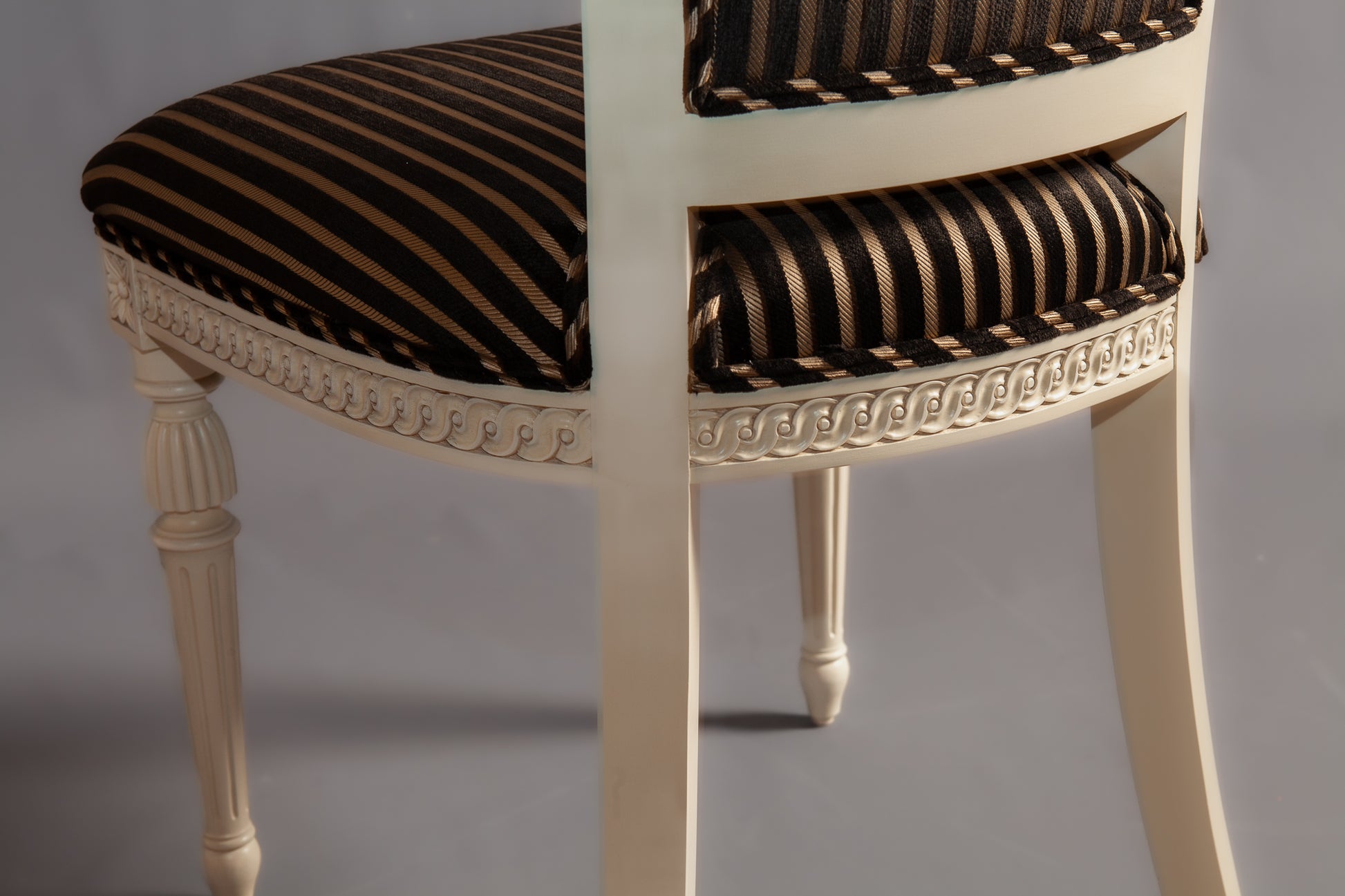 Close-up of the chair's seat cushion and upholstery pattern.