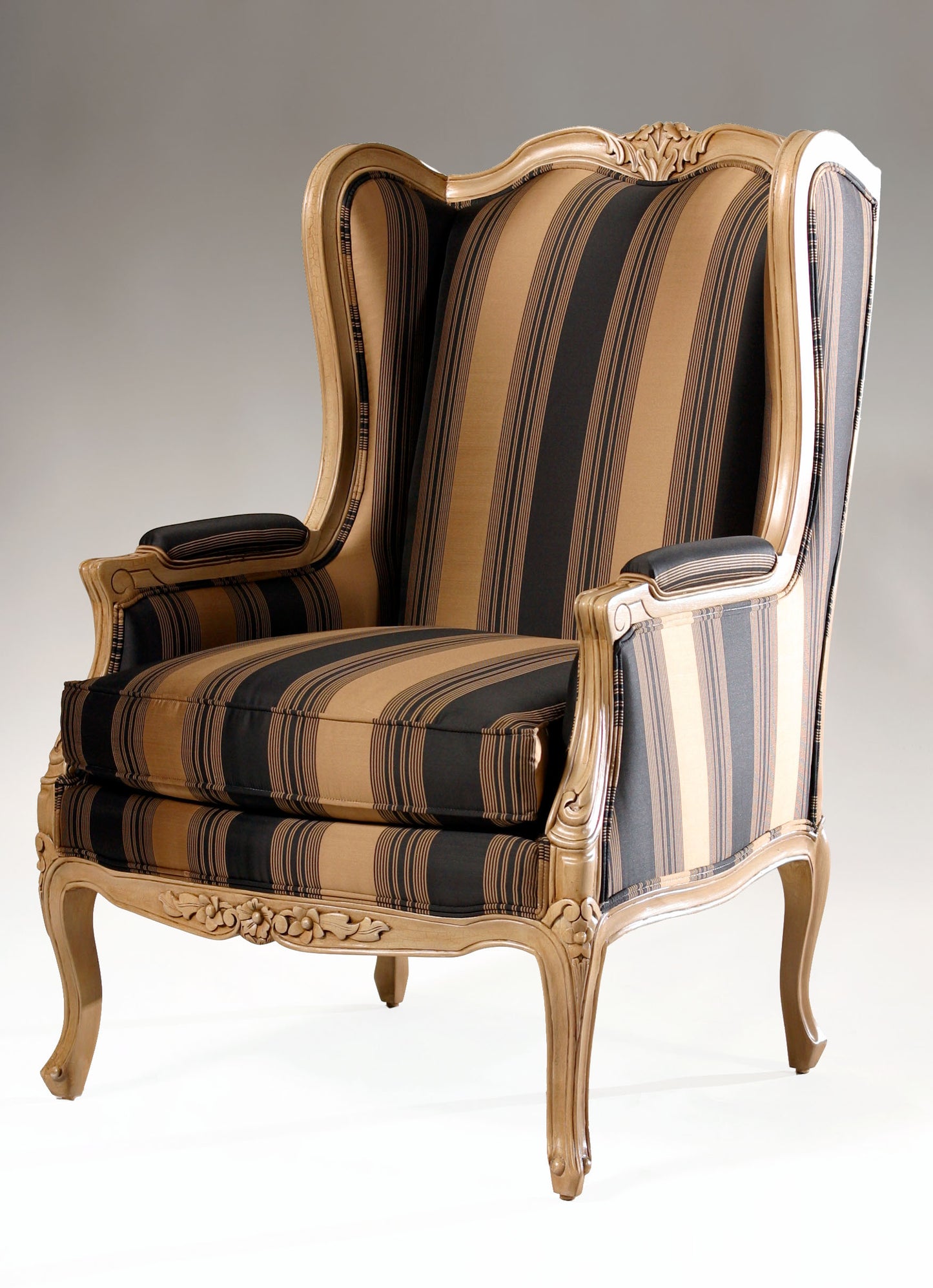 Louis-style wingback chair with a high cushioned back and wooden frame.