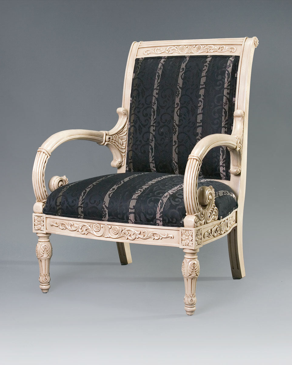 Versace armchair with ornate detailing and luxurious upholstery.