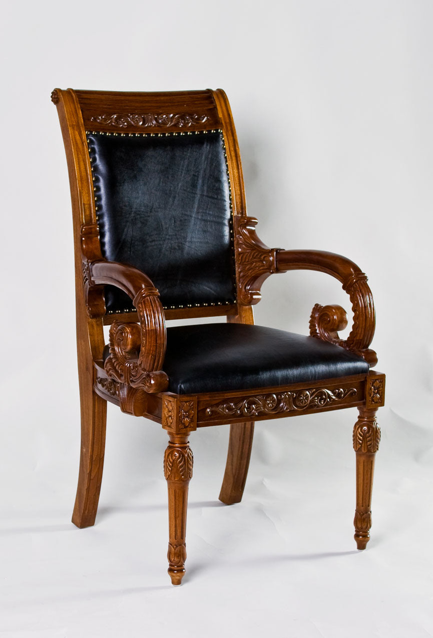 Versace arm dining chair with elegant design and comfortable seating.