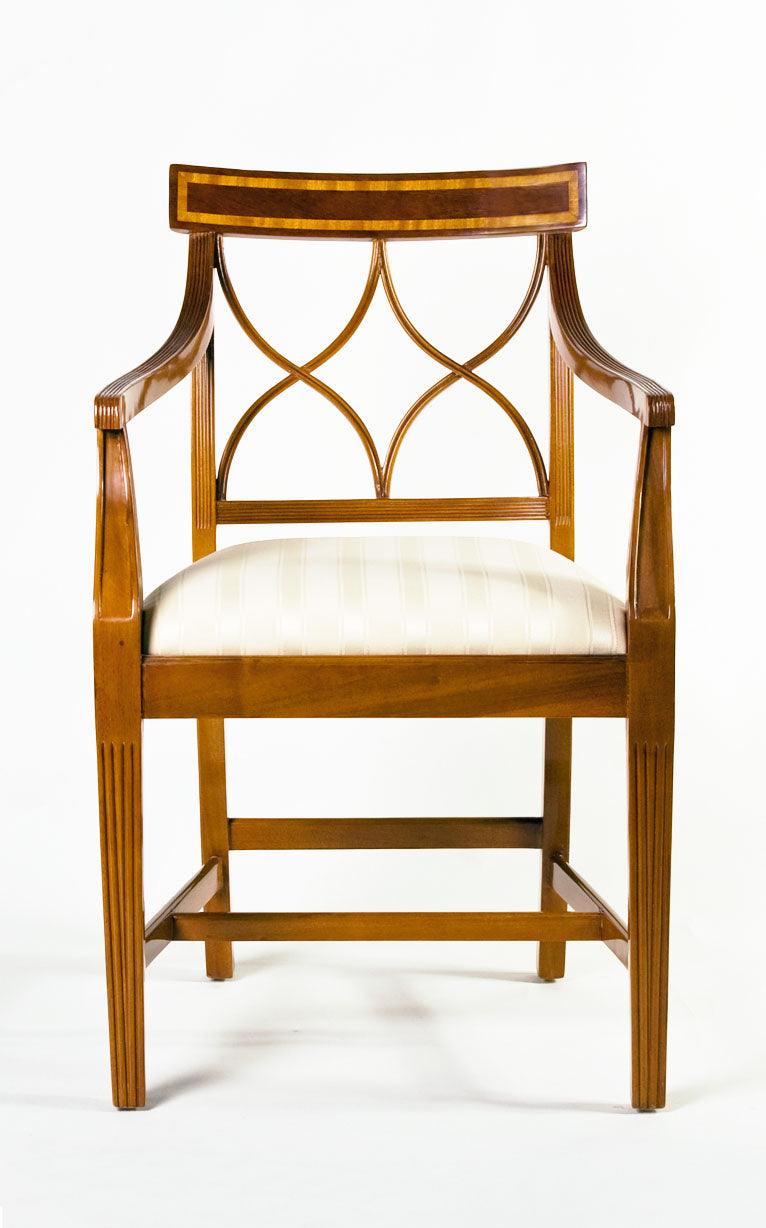Hourglass armchair with unique silhouette and stylish upholstery.