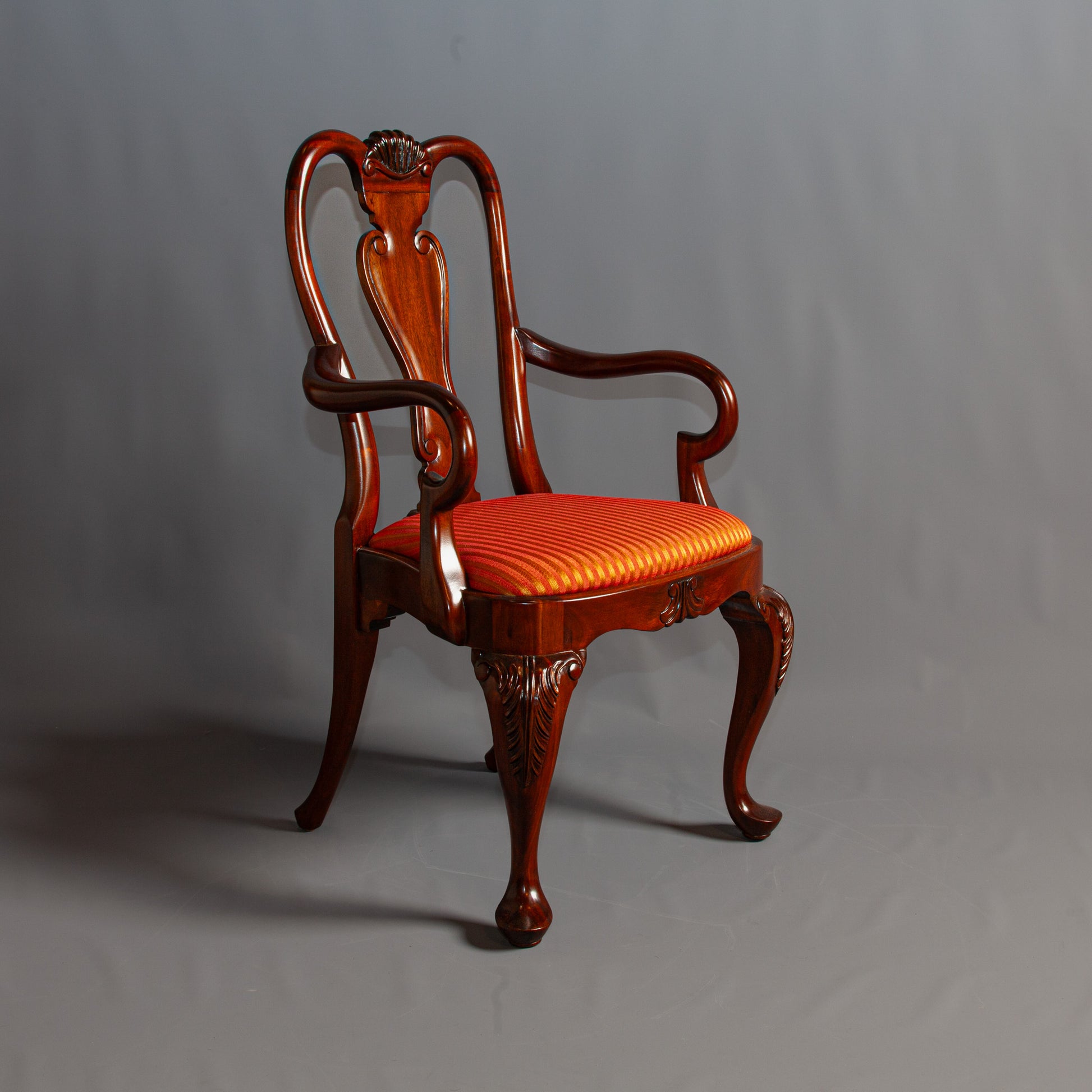 Side view of a classic wooden chair showcasing its detailed craftsmanship