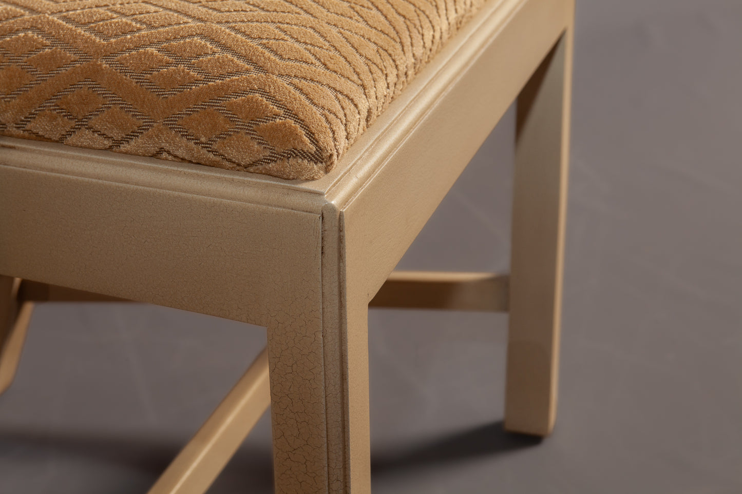 Angled perspective highlighting the chair's armrest design and upholstery.