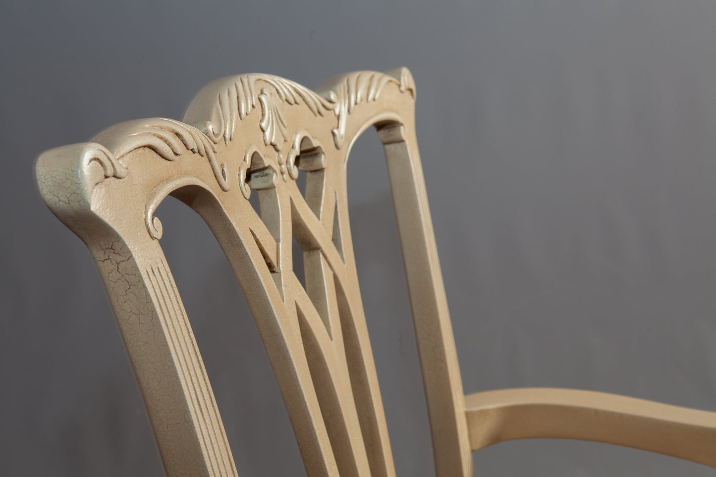 Full view of the wooden chair emphasizing its elegant design and finish.