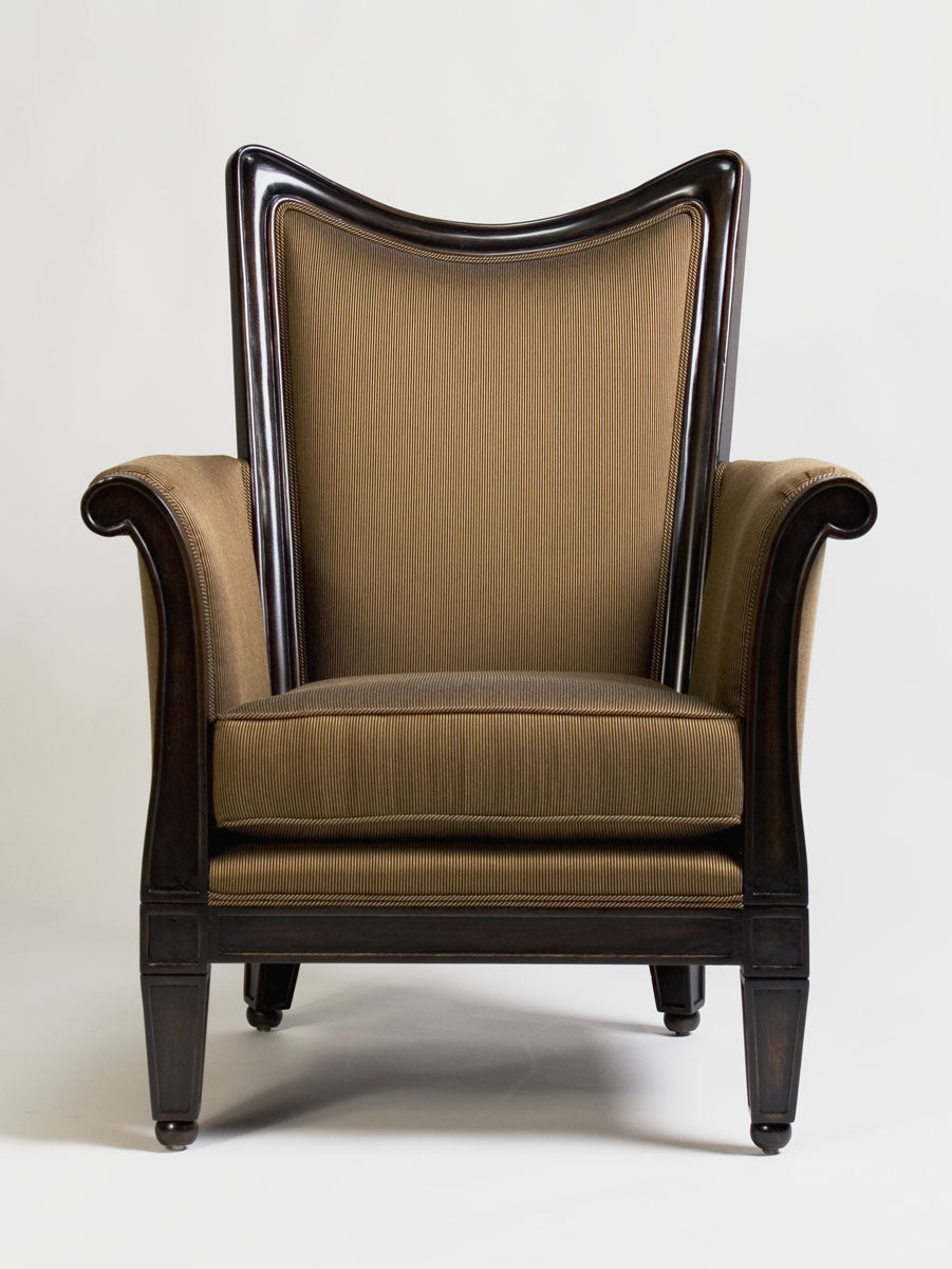 Elegant wooden chair with a curved backrest and upholstered seating.
