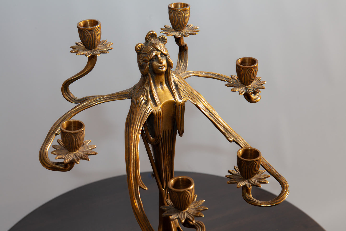 Top-down perspective of the Brass Woman Candelabra