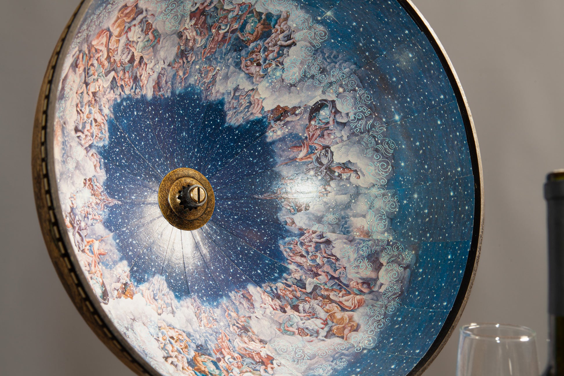 Celestial sphere painting with angels and starry sky