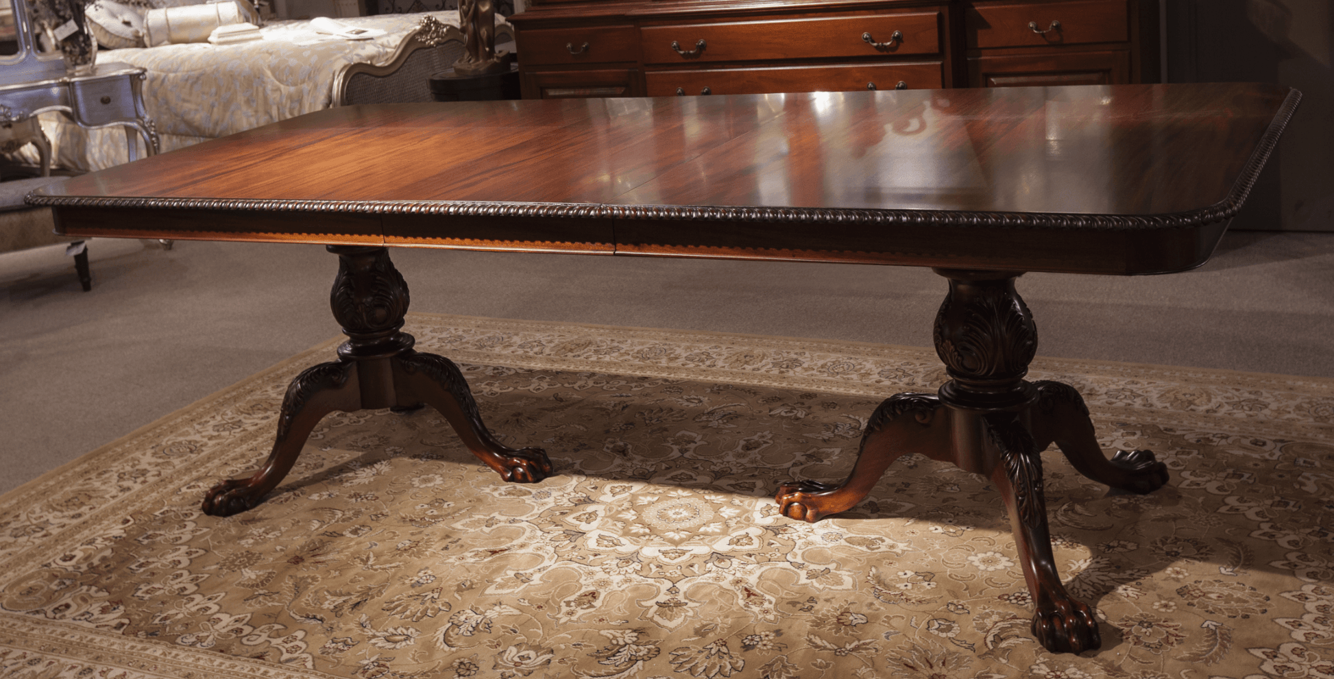 CHIPPENDALE PEDESTAL DINING TABLE WITH TWO LEAVES - House of Chippendale