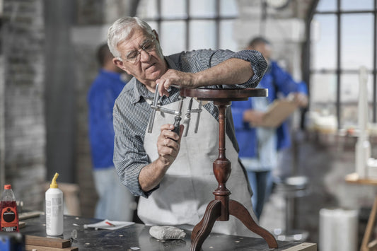 craftmen repairing furniture