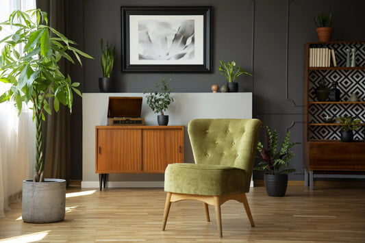 green chair next to plant