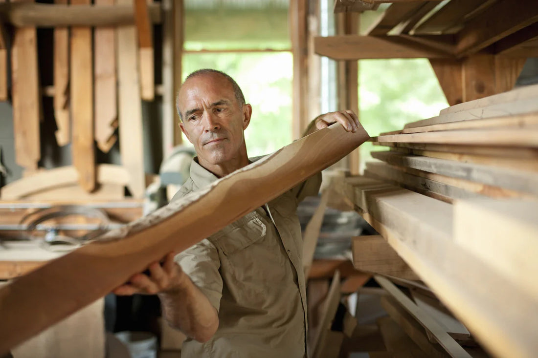 man sorting out wood