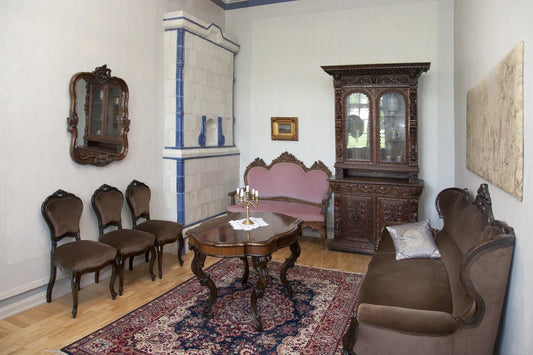 Woman restores old wooden chair for furniture repair - House of Chippendale