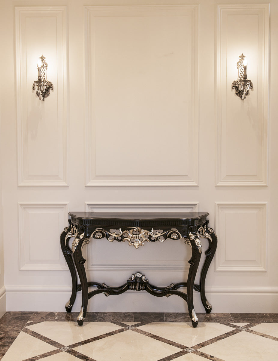 ornate black console table in classic interior