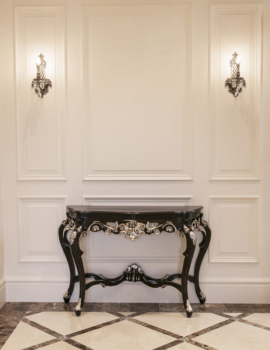 ornate black console table in classic interior