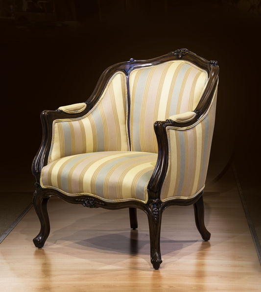 Graceful Louis XV armchair with fluted legs and detailed carvings
