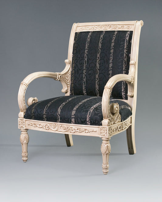 Versace armchair with ornate detailing and luxurious upholstery.