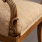 Detailed view of the chair’s backrest showcasing its elegant woodwork.