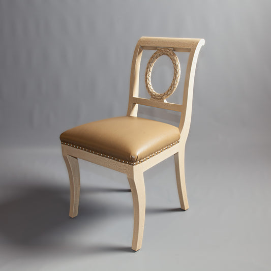 Full view of a classic side chair showcasing craftsmanship and luxurious upholstery