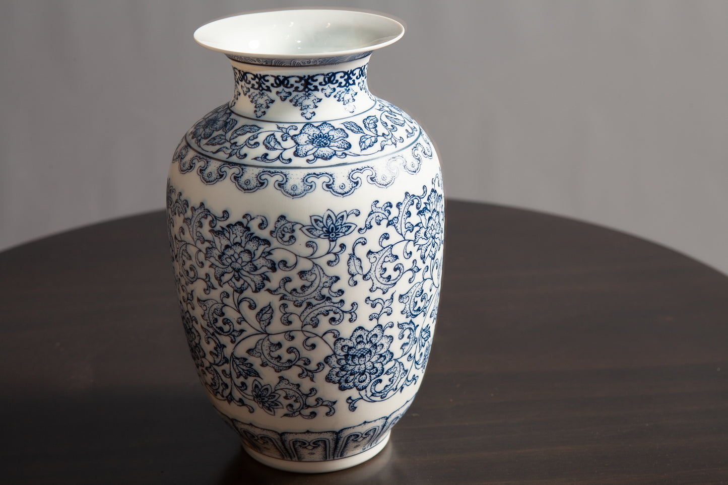 Detail view of blue and white porcelain vase with floral pattern